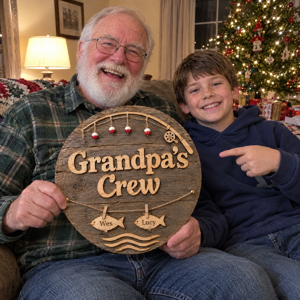 Grandson points at his name on Grandpa's Crew sign at Christmas