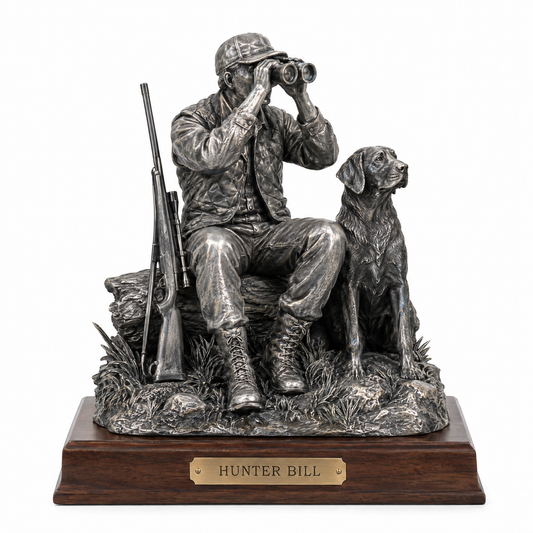 Pewter hunter and Labrador statue on walnut base, plaque HUNTER BILL