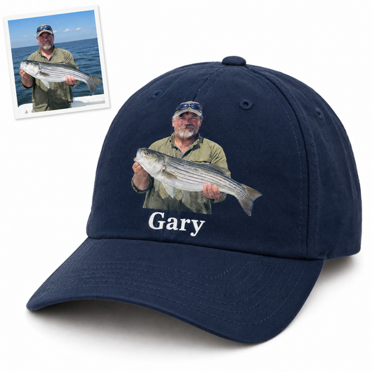 Navy fishing cap printed with angler photo holding striped bass and name Gary