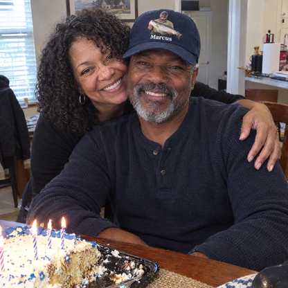 Husband wears birthday photo cap from his wife