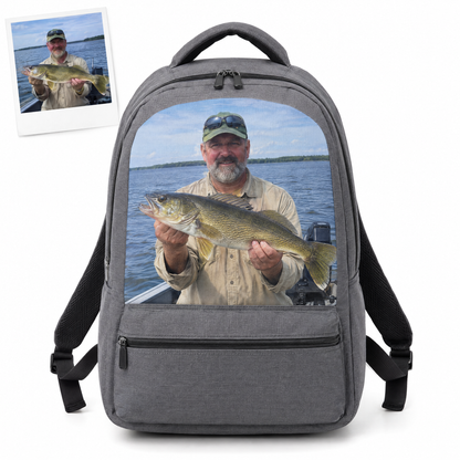Gray backpack printed with angler photo holding a walleye