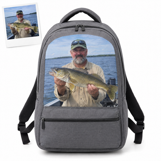 Gray backpack printed with angler photo holding a walleye
