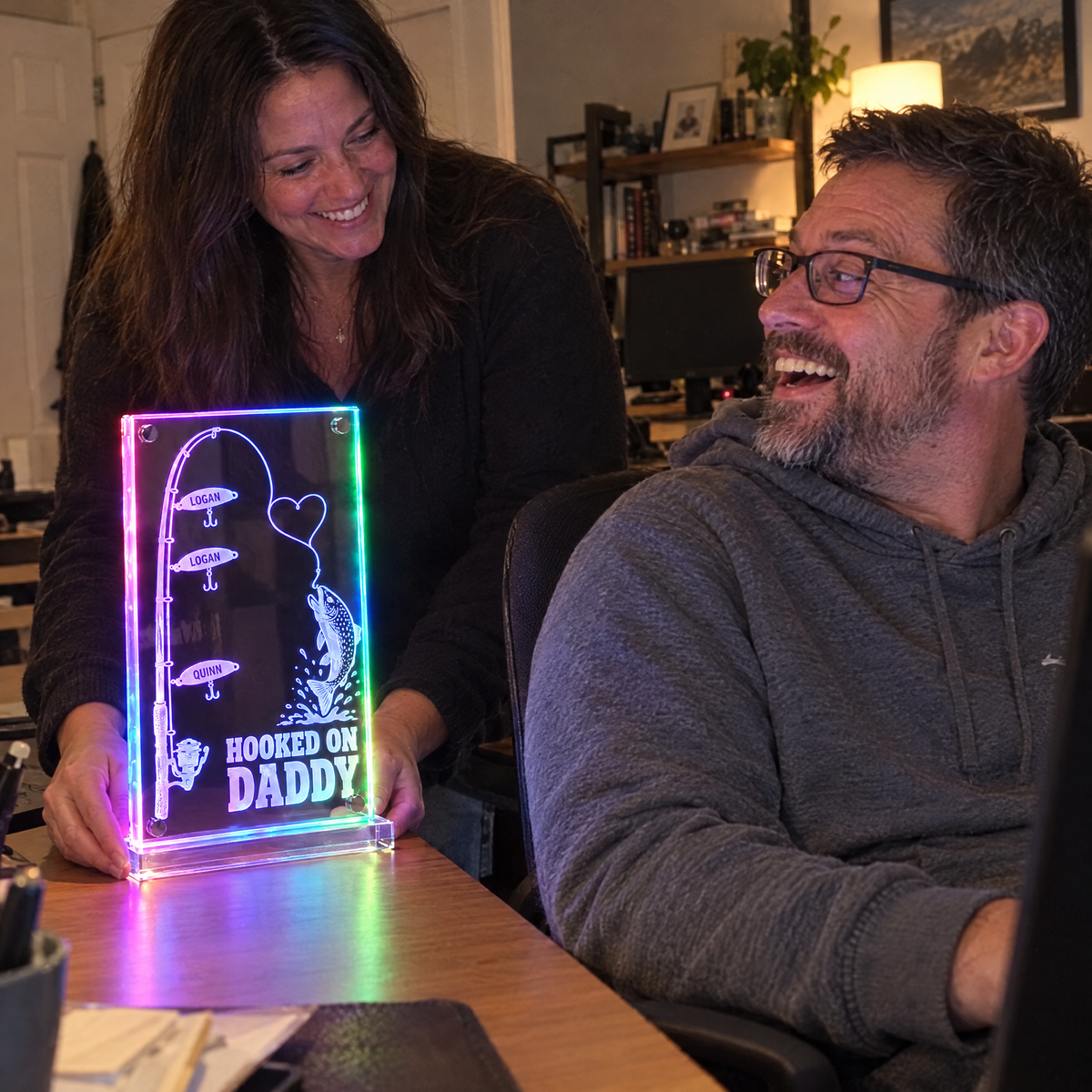 Wife surprises husband with glowing HOOKED ON DADDY light for his birthday