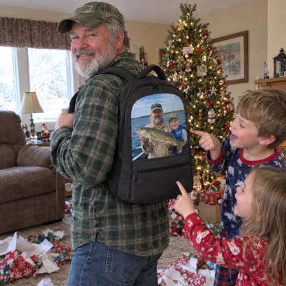 Grandpa wears his photo backpack as grandkids cheer at Christmas