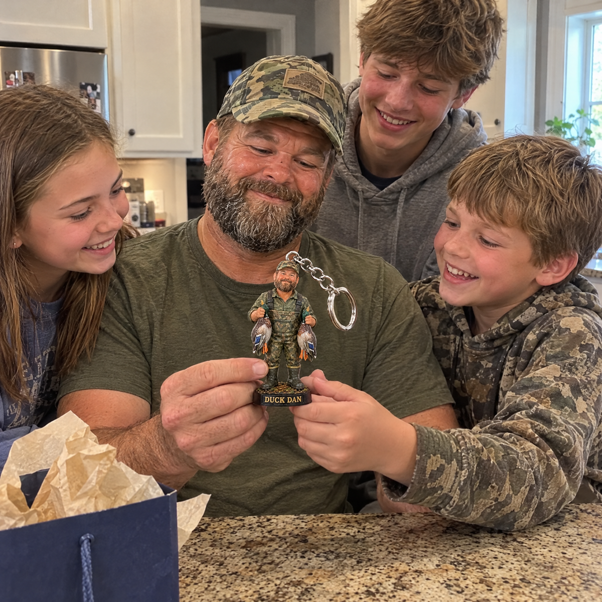 Kids give dad duck hunter keychain on his birthday
