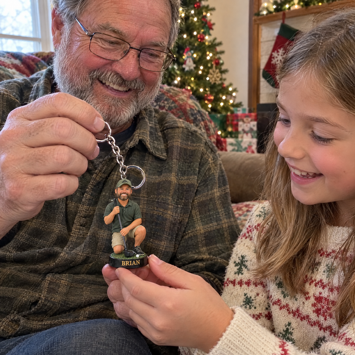 Grandpa shows the golfer keychain to his granddaughter at Christmas