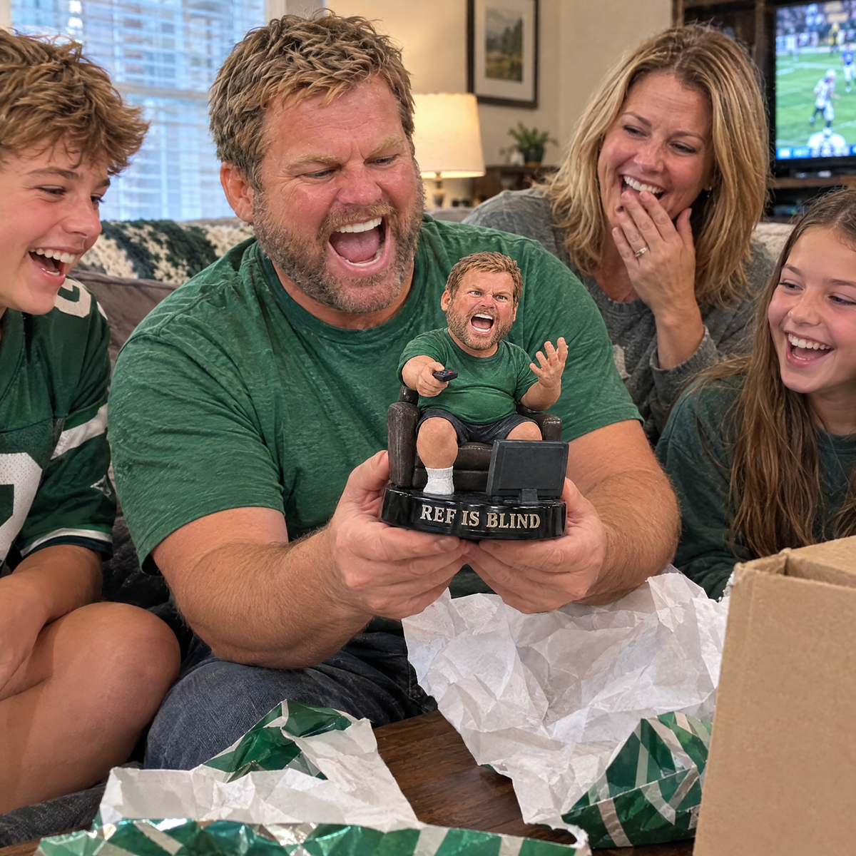 His family laughs as he unwraps the funny football dad figurine on game day