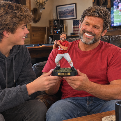 His son gives him the realistic football figurine in the man cave