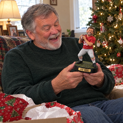 Grandpa opens the realistic football figurine at Christmas
