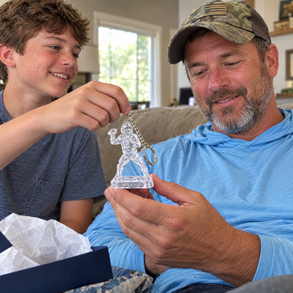 His son gives him the crystal-style football keychain on Father's Day