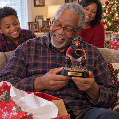 Grandpa opens the catcher figurine at Christmas