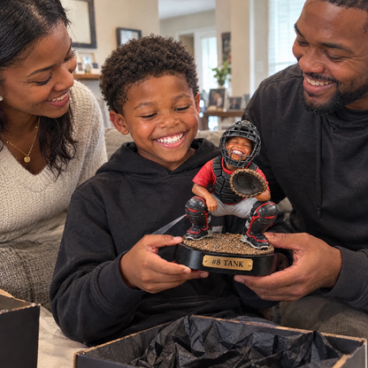 His parents give him the catcher figurine at the end-of-season party