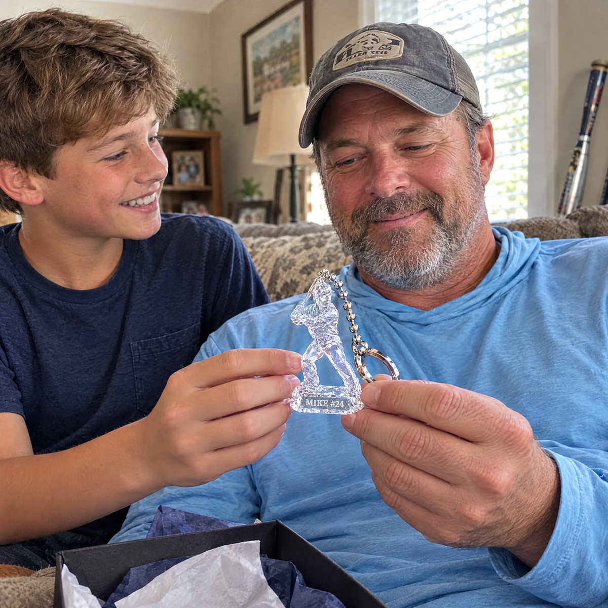 His son gives him the crystal-style baseball keychain on Father's Day