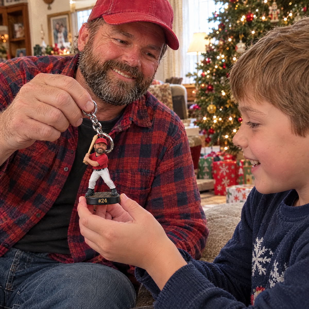 Grandpa shows the baseball player keychain to his grandson at Christmas