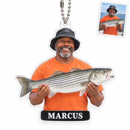 Acrylic car charm of man holding striped bass, name MARCUS