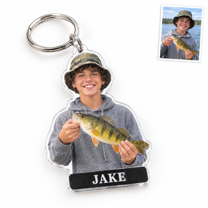 Acrylic keychain of teen boy with yellow perch, name JAKE