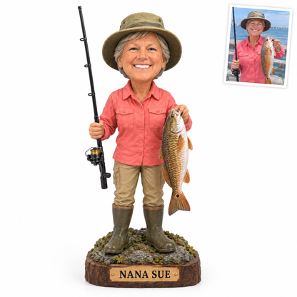 Woman angler with redfish figurine, name NANA SUE