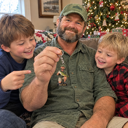 Grandpa holds fishing figurine keychain with grandsons at Christmas